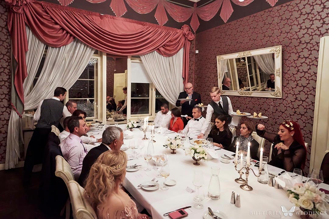 Serving dinner at Villa Richter, destination wedding in Prague