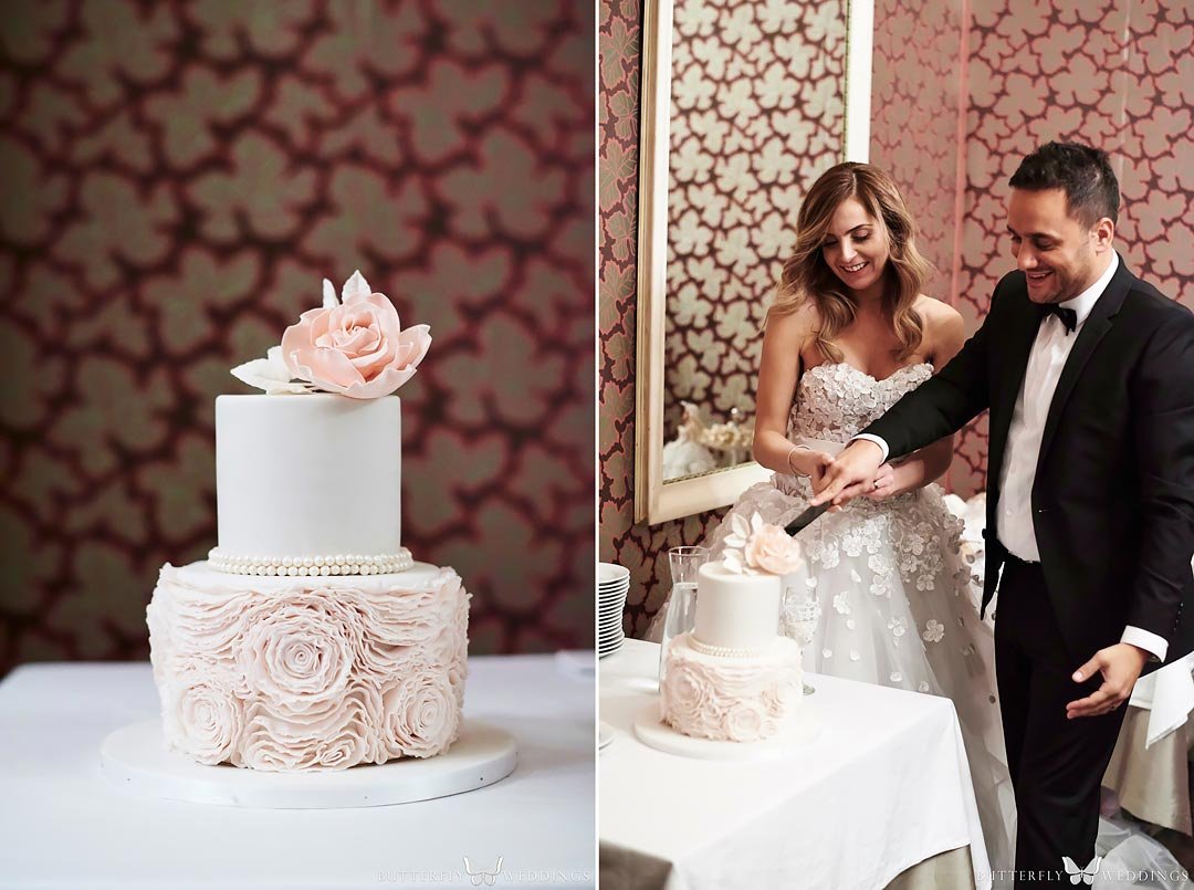 Beautiful light pink and white wedding cake with pearls.