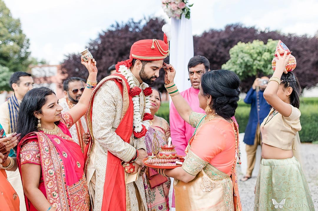 indian wedding groom traditions in prague troja Chateau